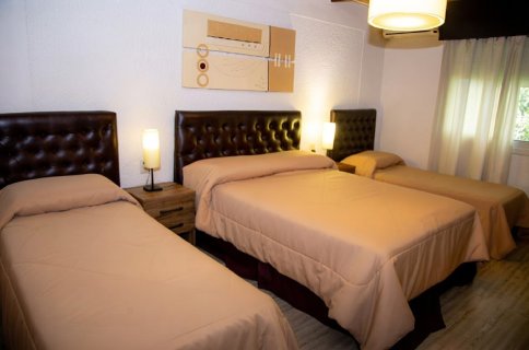 Habitación familiar con varias camas